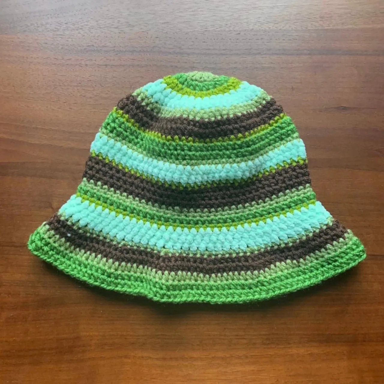 Handmade striped crochet bucket hat in green and brown